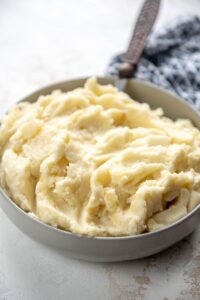 mashed potatoes in a gray bowl