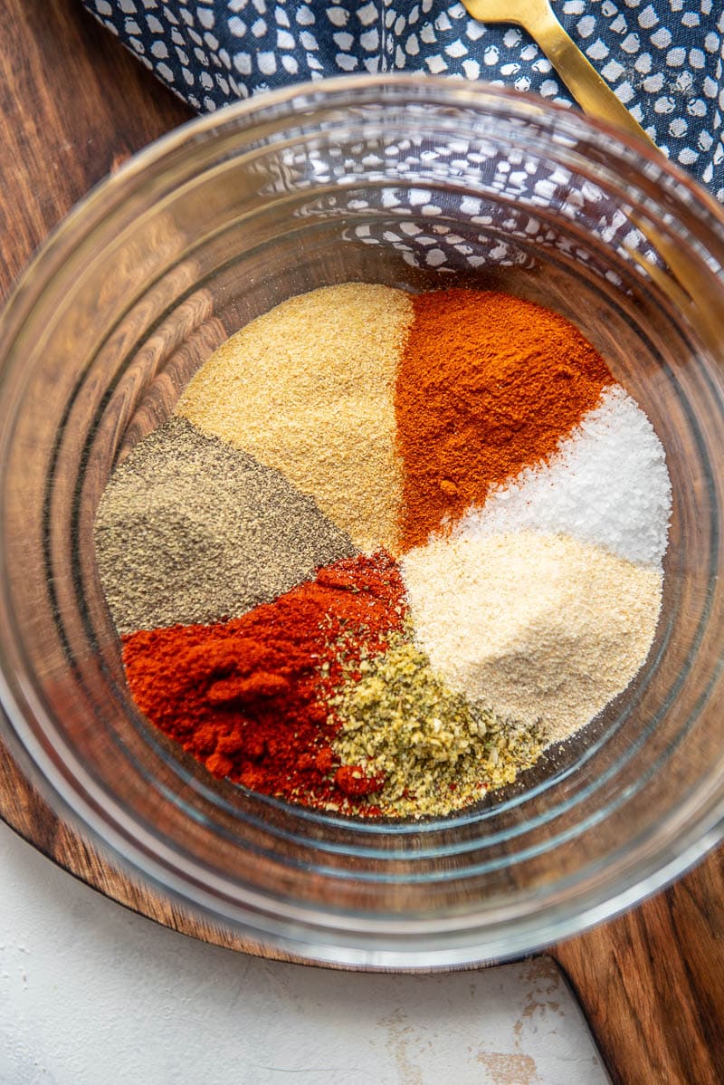 ingredients for cajun seasoning in a glass bowl