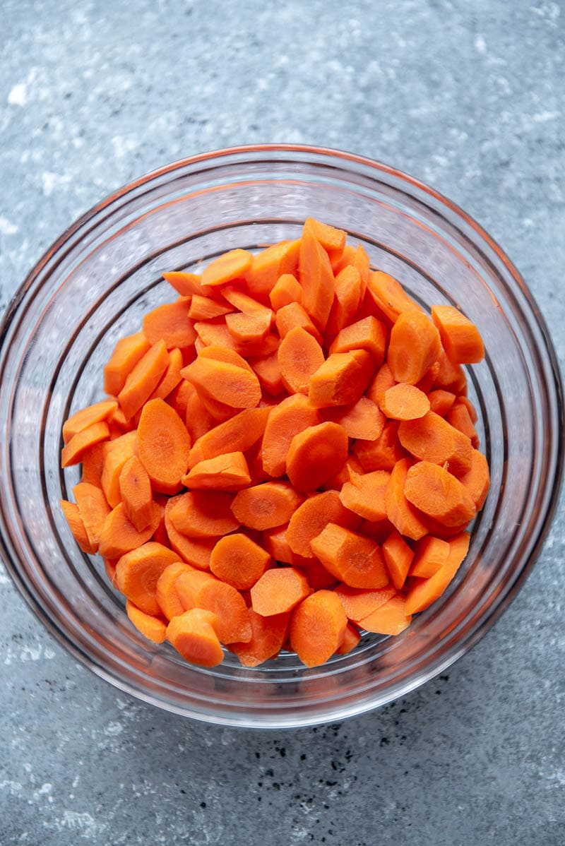 chopped carrots in a glass bowl