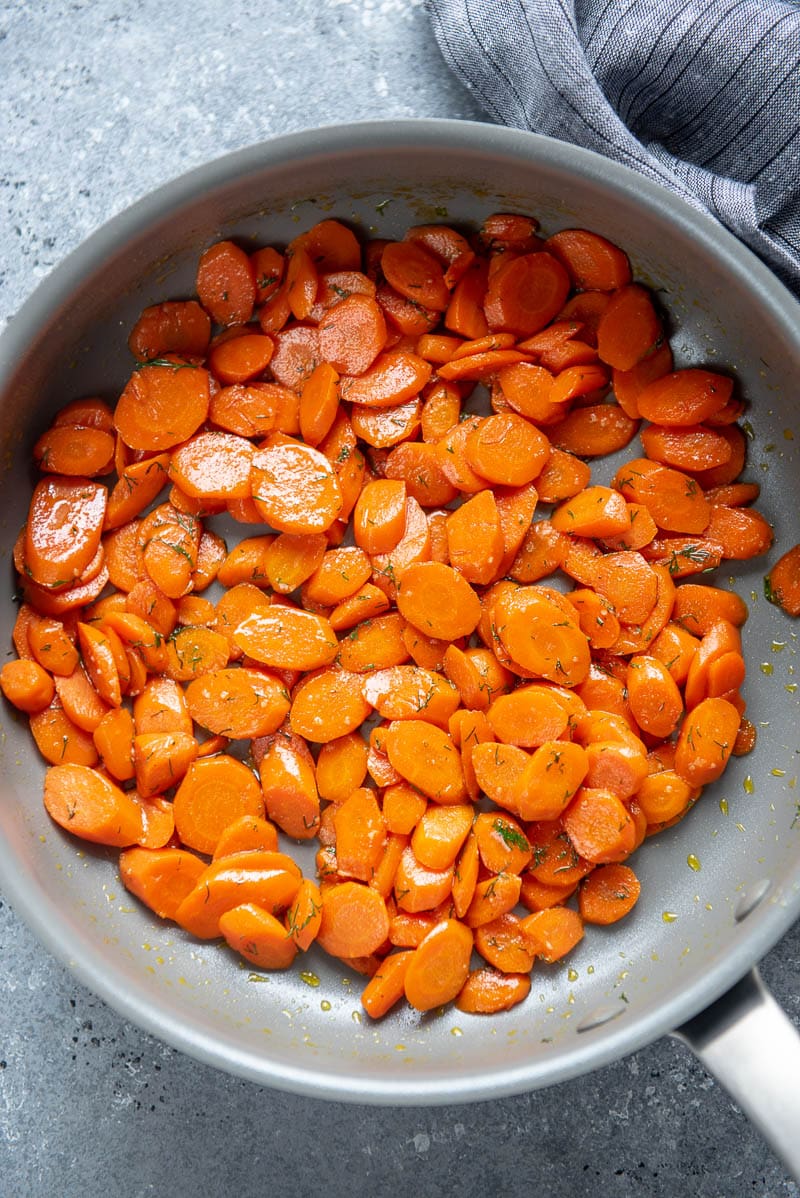 sauteed carrots in a pan