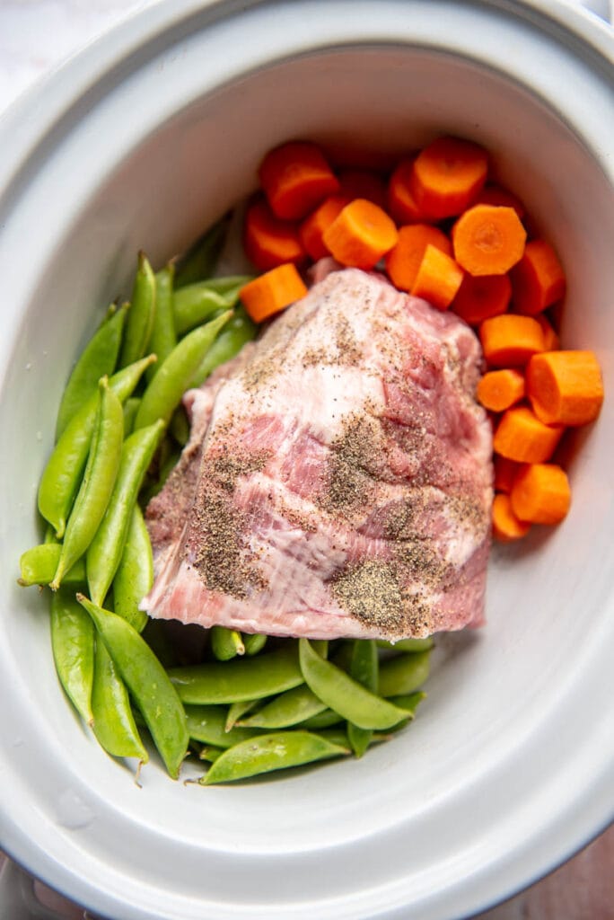 pork shoulder snap peas and carrots in a slow cooker