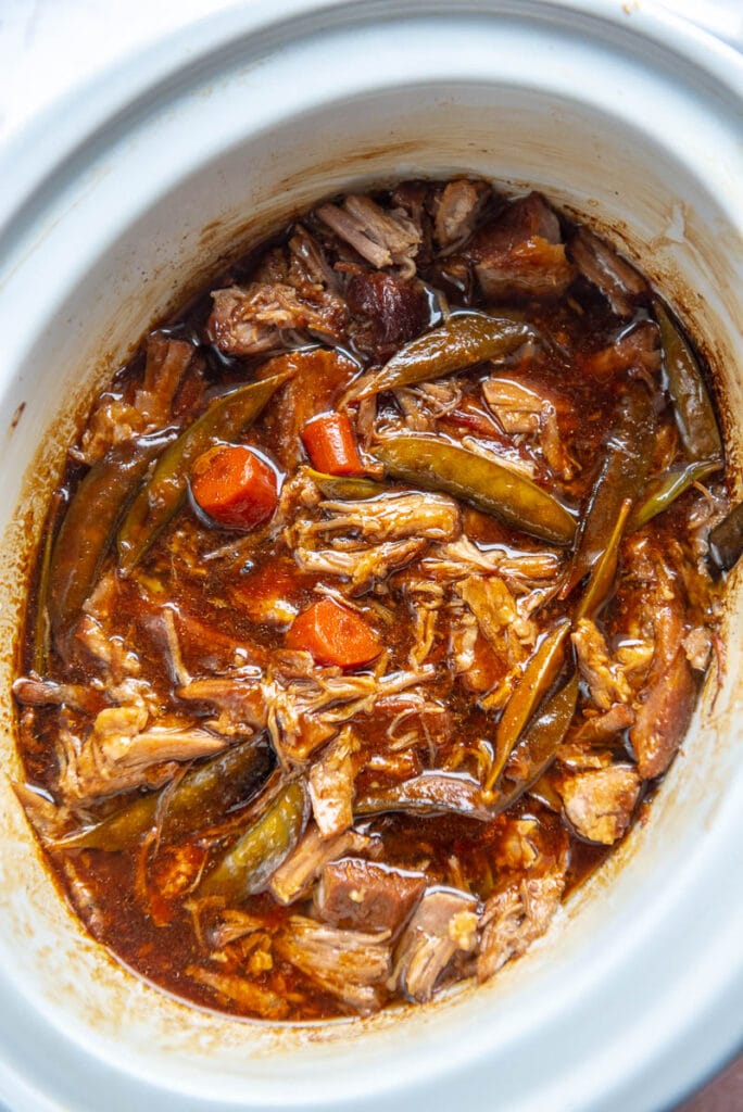 cooked ginger pork in a slow cooker