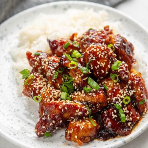 general tso chicken and rice on a plate