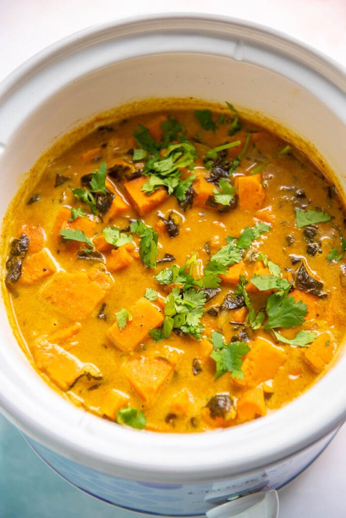 cooked sweet potato curry in a slow cooker
