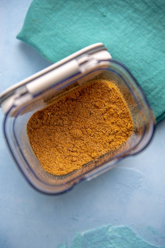 rectangle spice container filled with curry seasoning 