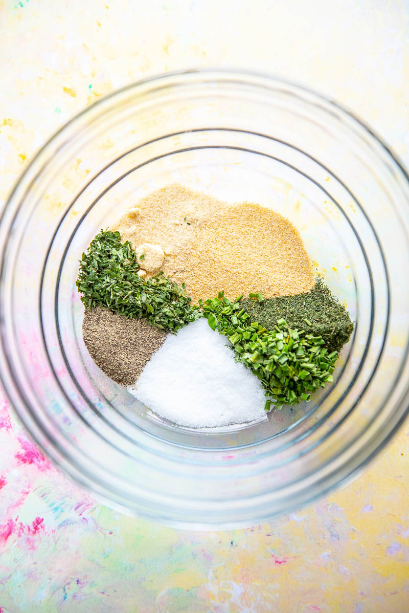 glass bowl filled with 7 seasonings ready to mix