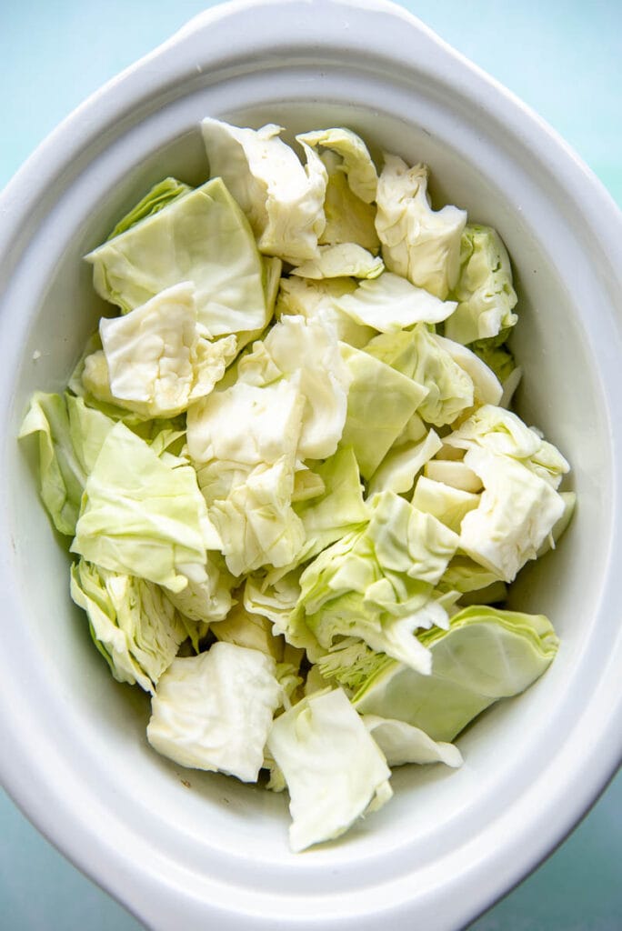 chopped cabbage in slow cooker