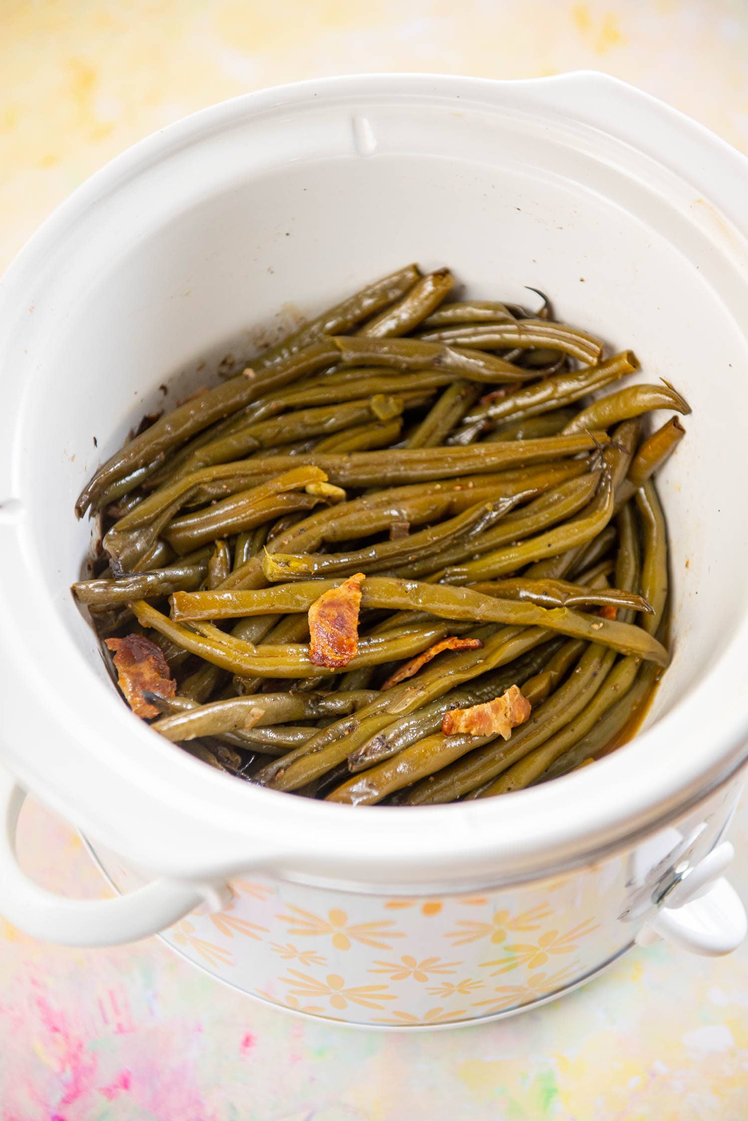 cooked fresh green beans in round slow cooker