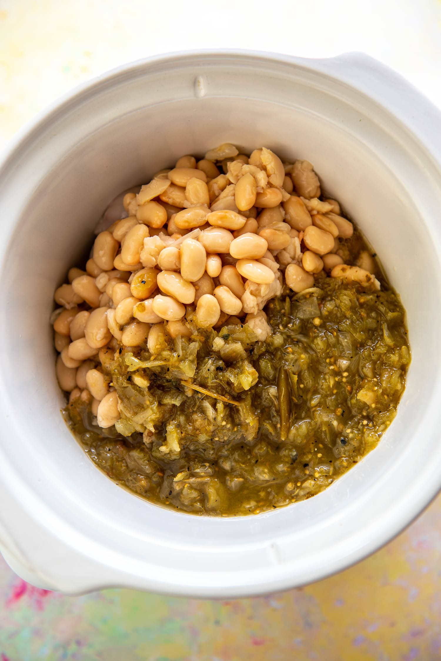 white beans and salsa verde in slow cooker