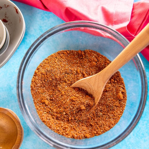 small glass mixing bowl with spices for bbq rub