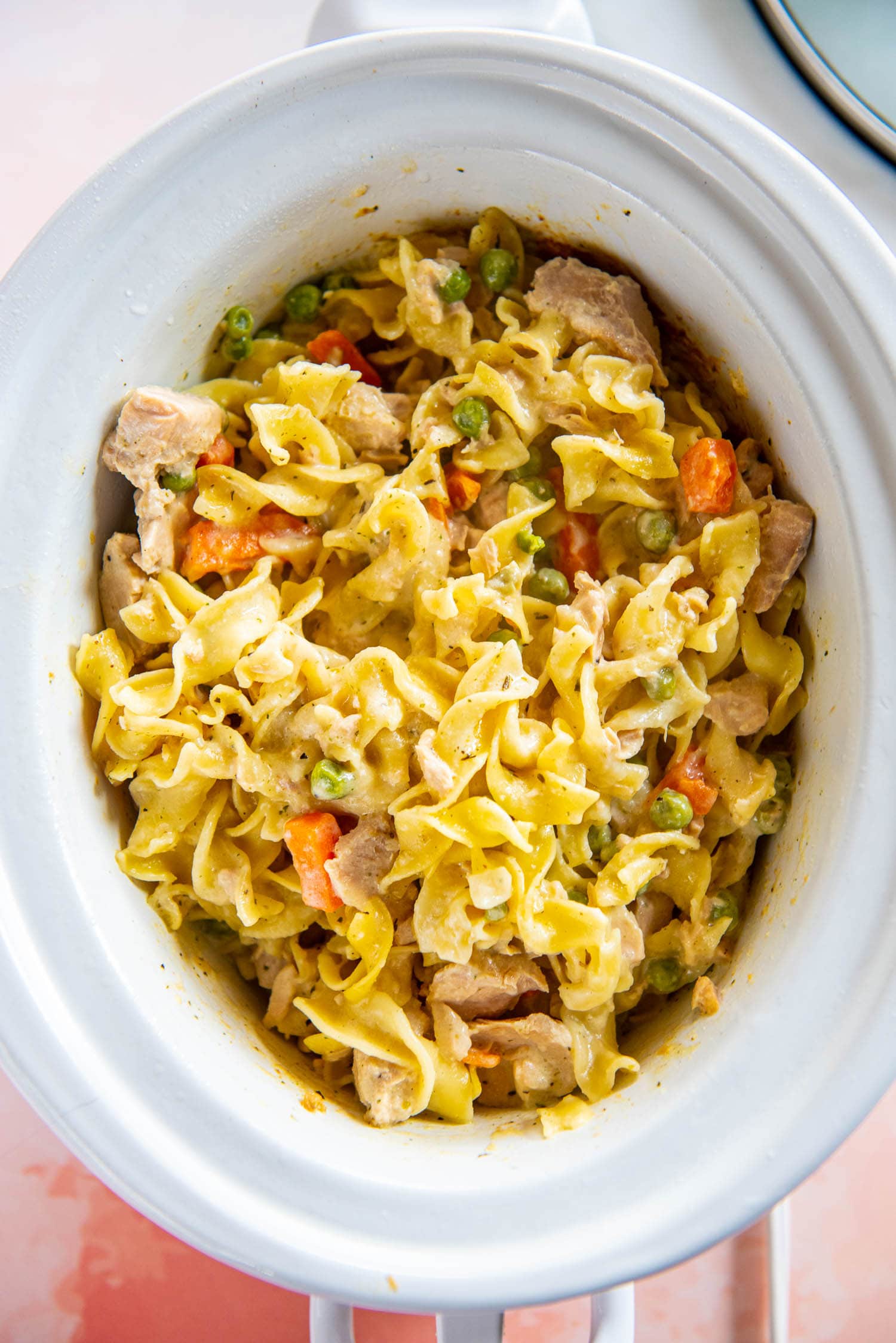 cooked tuna, noodles and veggies in a slow cooker