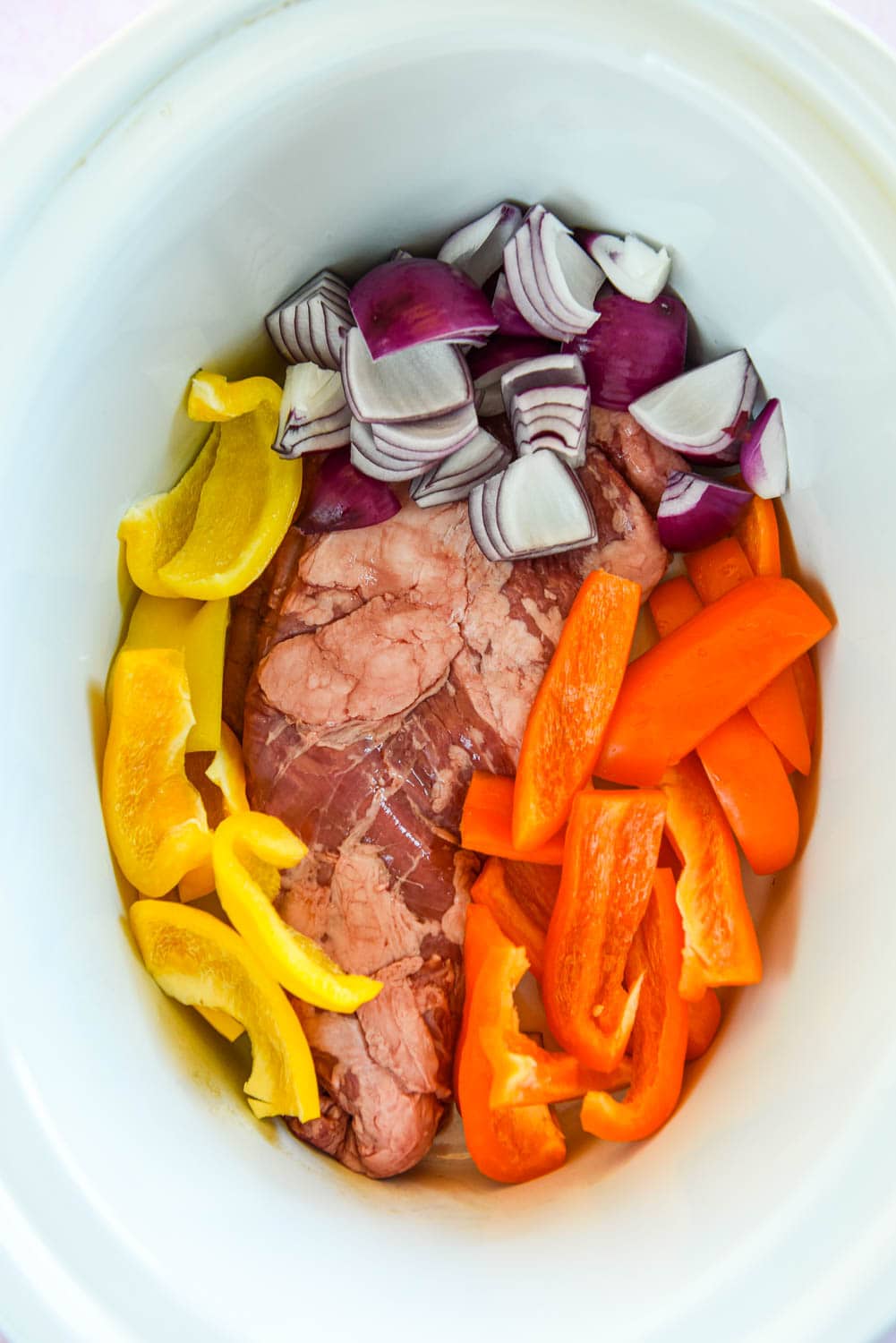 steak, peppers and onions in slow cooker