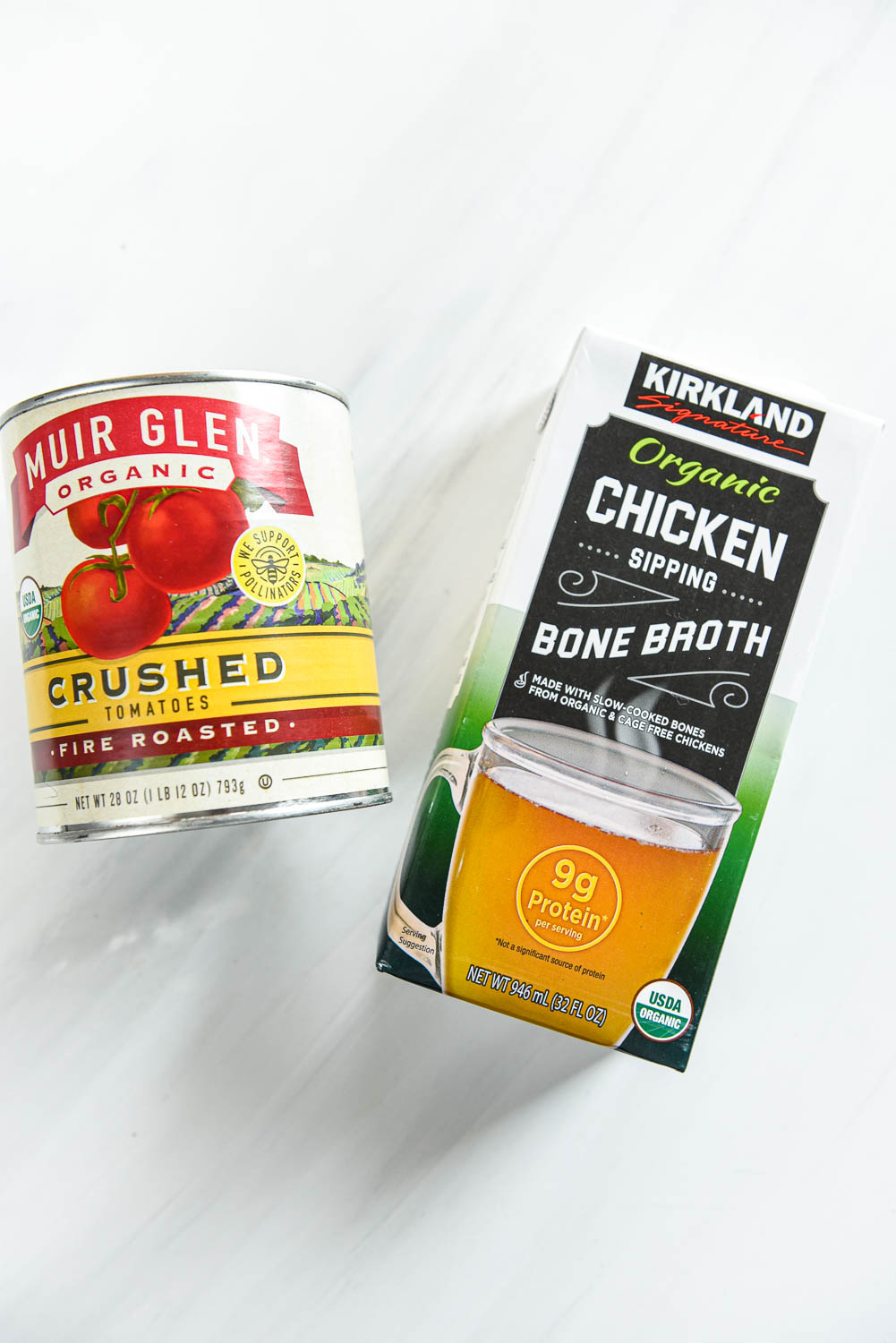 can of crushed tomatoes and box of chicken bone broth