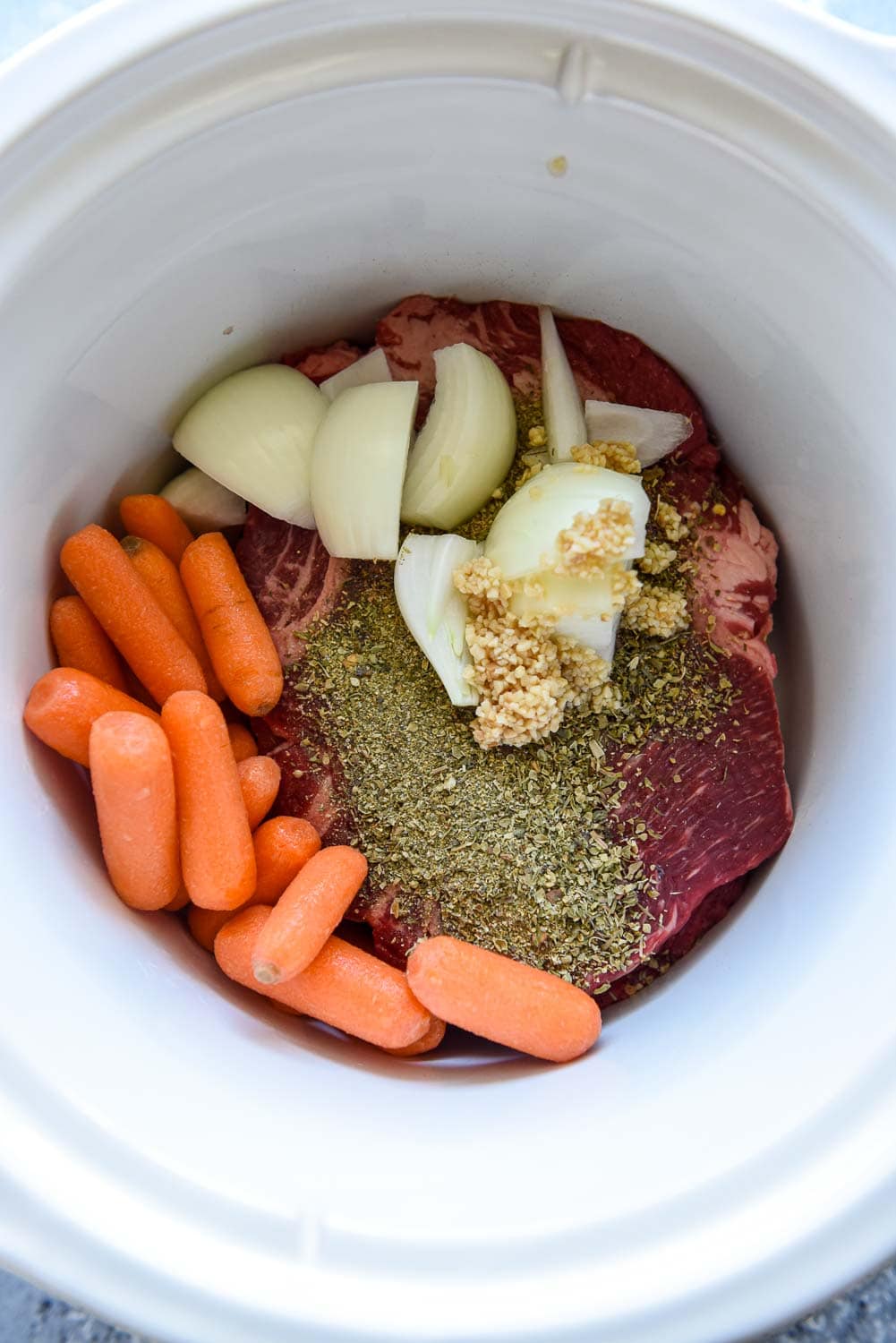 Enjoy roast & carrots w/ this 7-Qt. Crock-Pot slow cooker at just