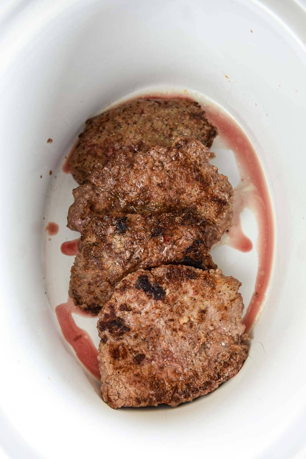 Cooked swiss steak in slow cooker
