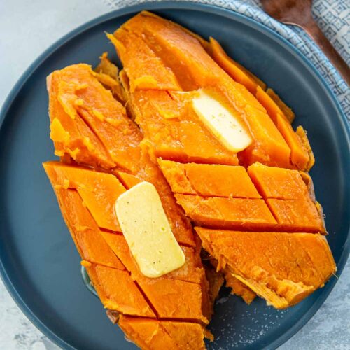 sweet potatoes cut up with butter on top