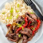 slow cooker pepper steak served on plate
