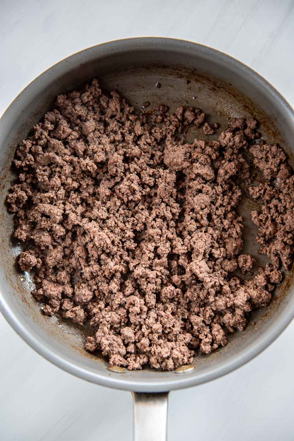 Ground beef cooked in skillet