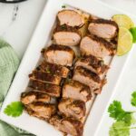 sliced Easy Slow Cooker Pork Roast on plate