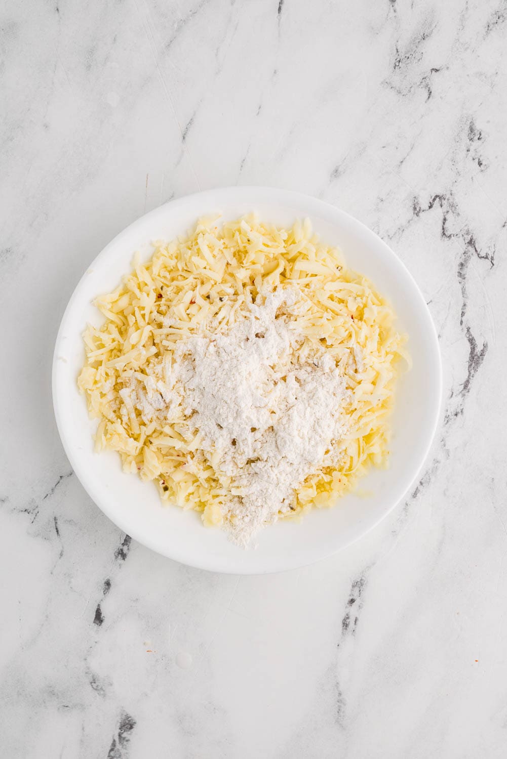 shredded pepper and jack cheese in a bowl ready to prepare a recipe