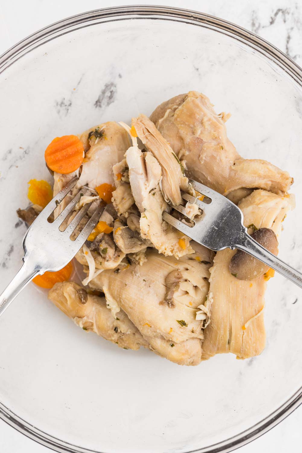 Chicken being shredded