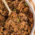 Bowl of Slow Cooker Kalua Pork garnished and seved