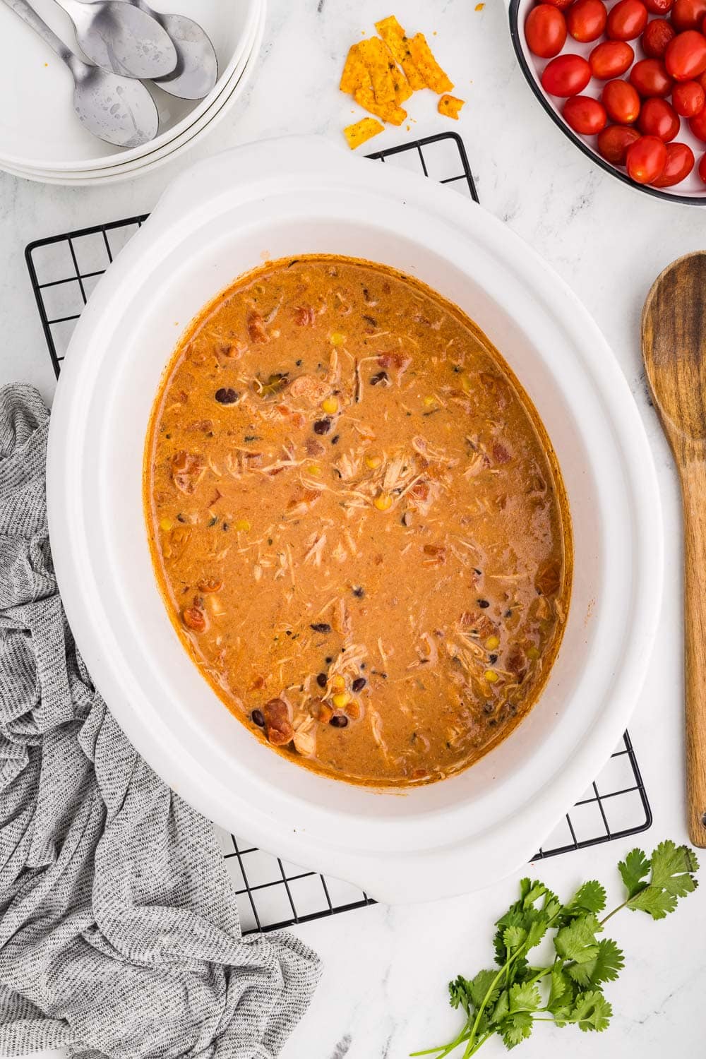 Slow Cooker Creamy Chicken Enchilada Soup cooked and ready to serve still inside of slow cooker