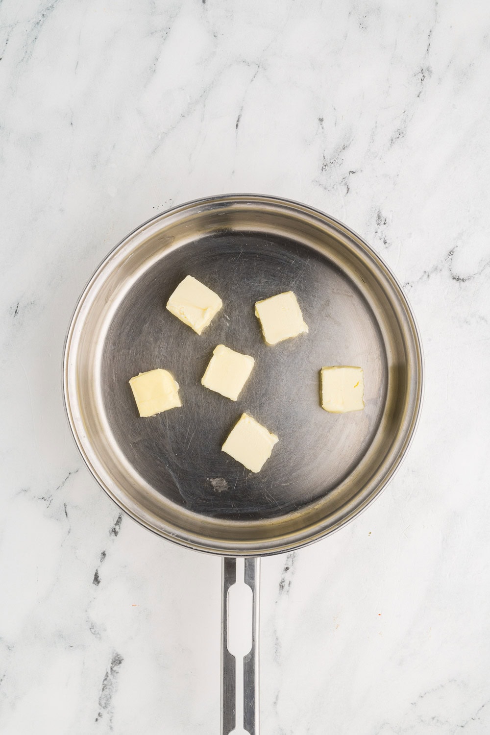 6 pieces of butter in skillet
