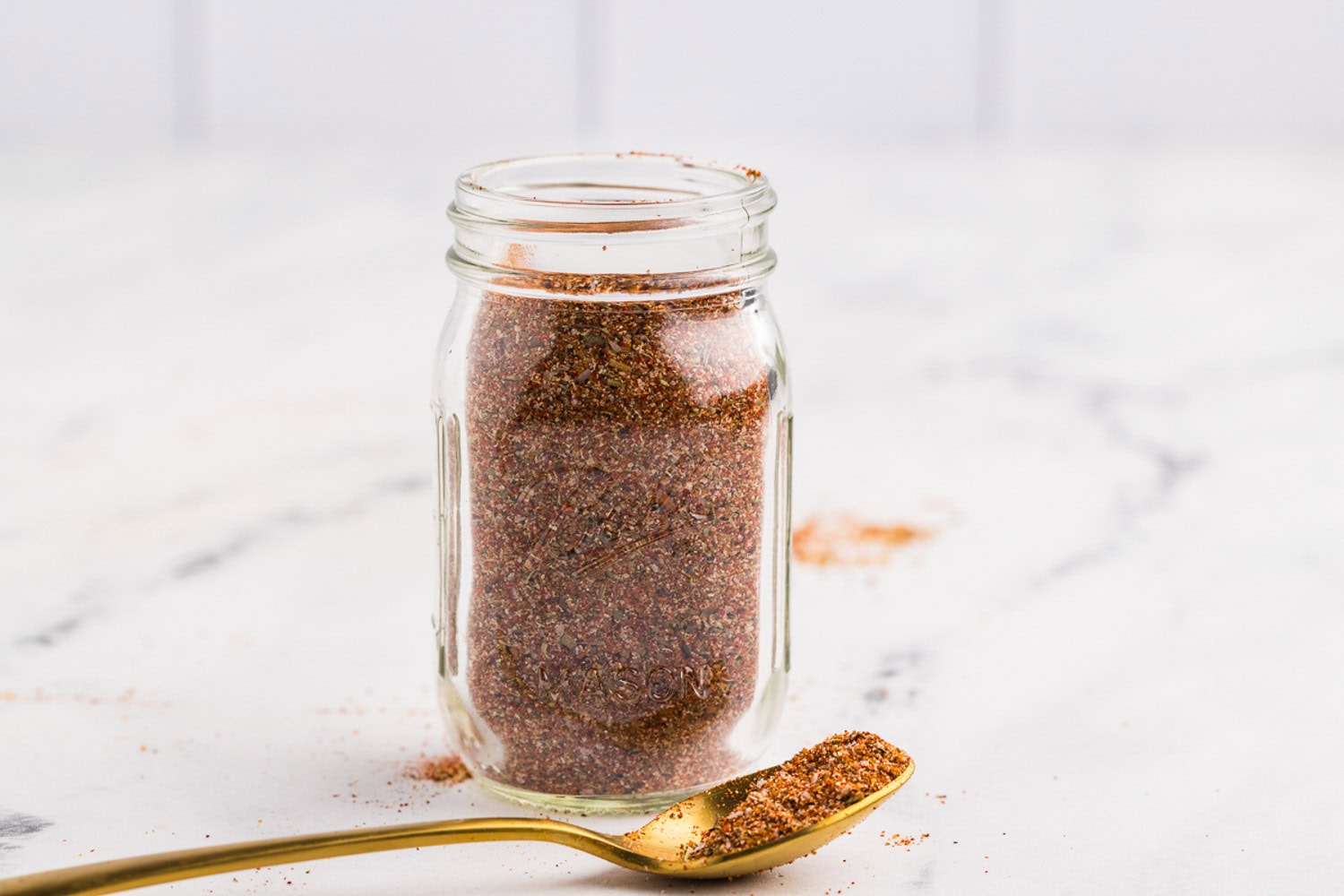 Easy Pot Roast Seasoning Recipe ready next to spoon in jar