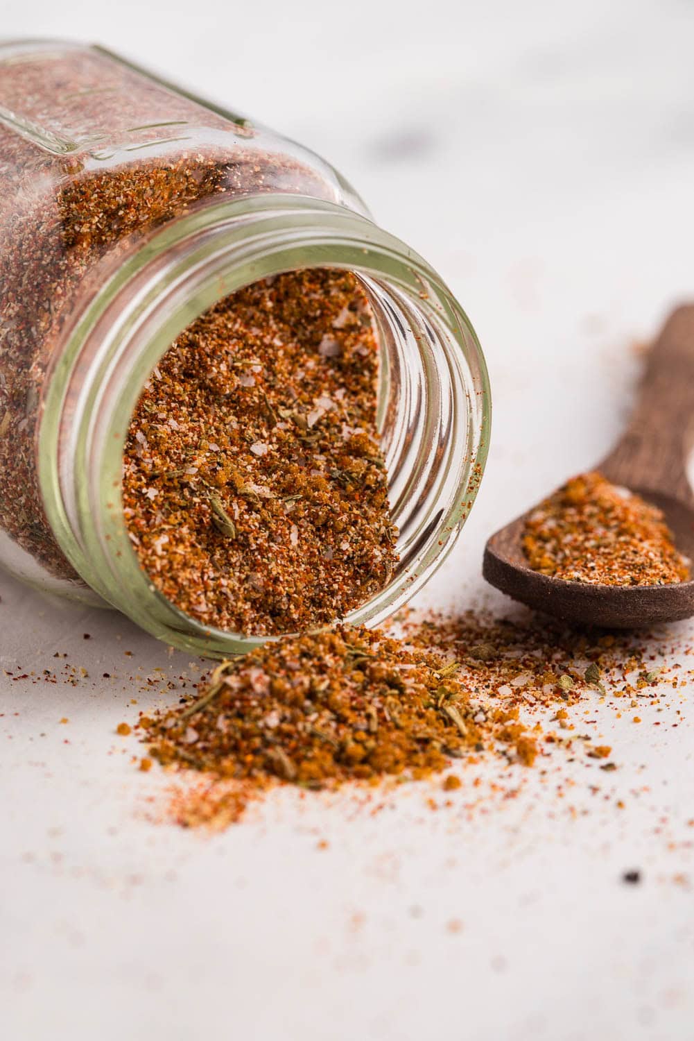 Easy Pot Roast Seasoning Recipe spilling out of jar on counter