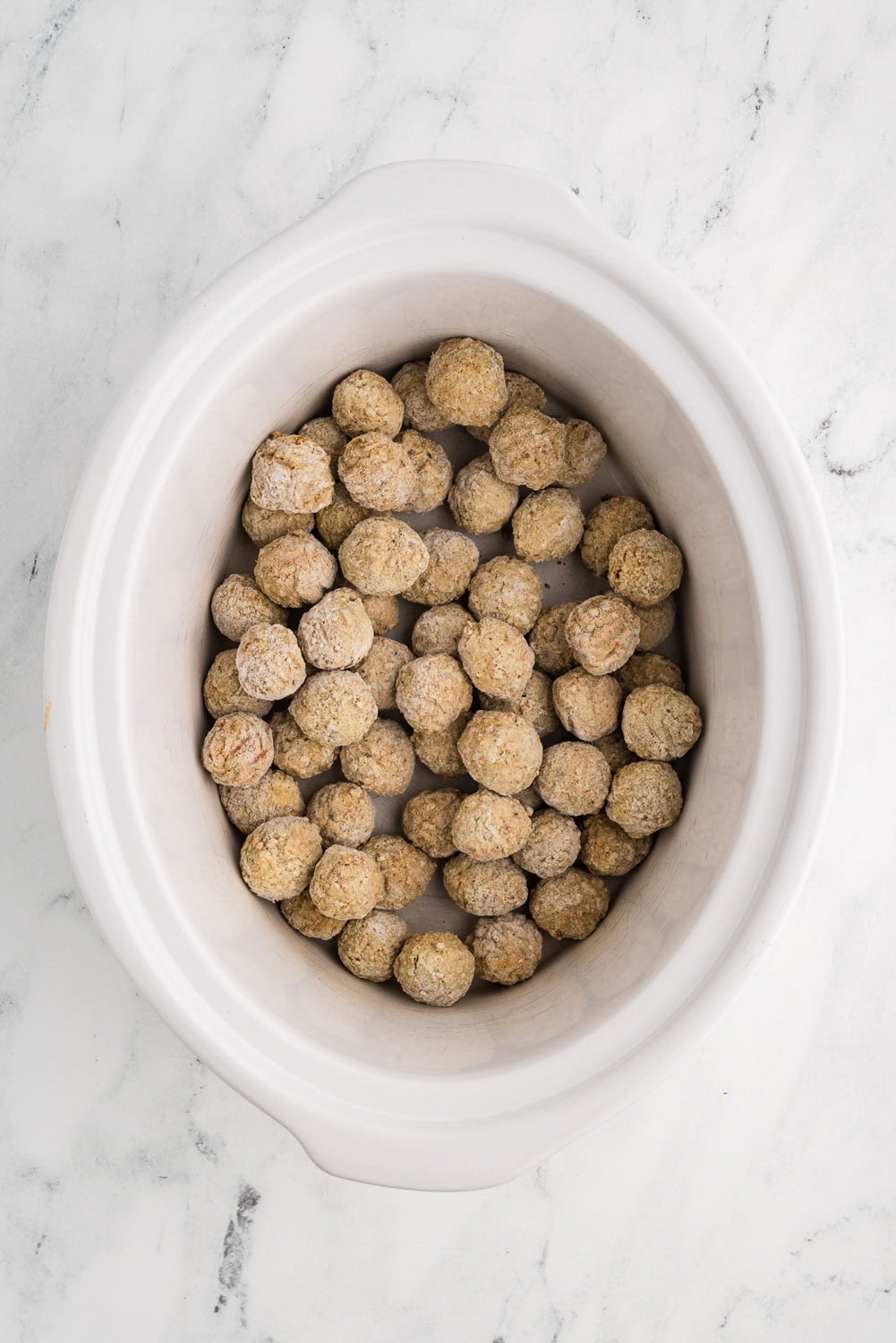 Frozen meatballs in slow cooker