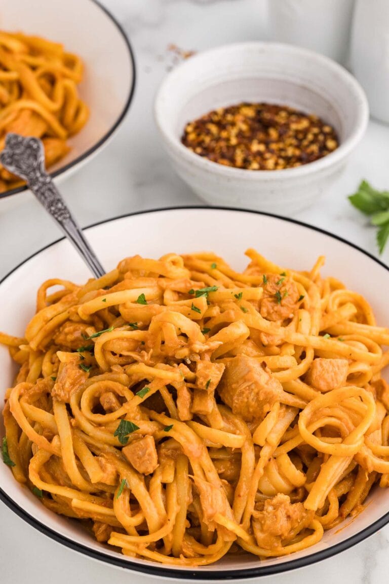 Slow cooker firecracker Chicken served and garnished