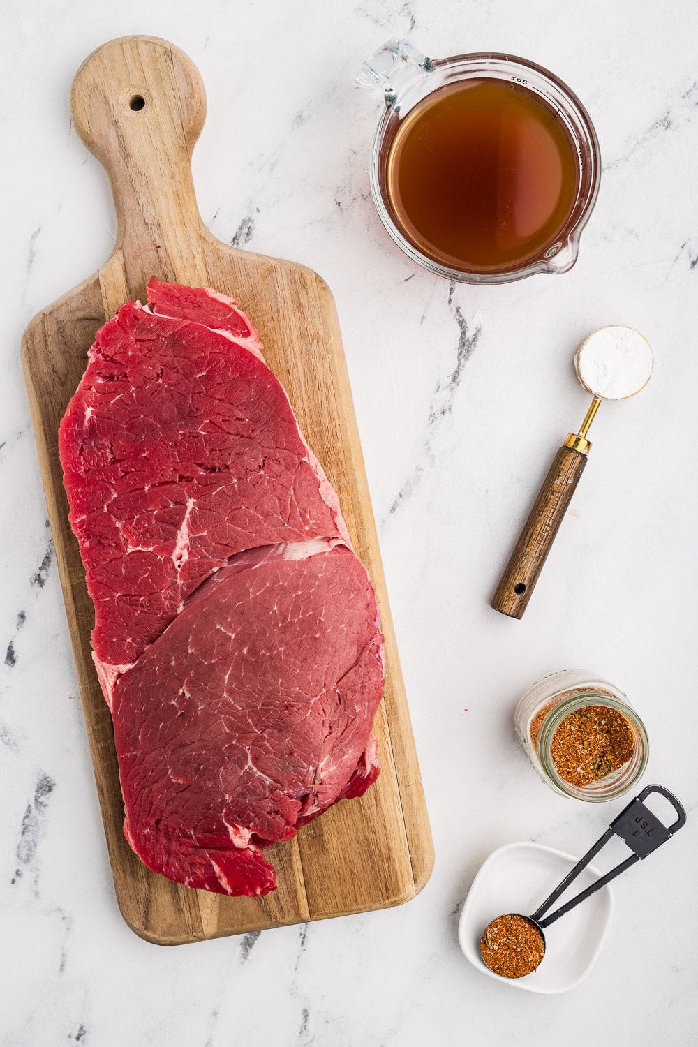 2 pound top round roast (london broil) 2 tablespoons pot roast seasoning 1 cup beef broth 1 tablespoons cornstarch all on counter ready to cook recipe
