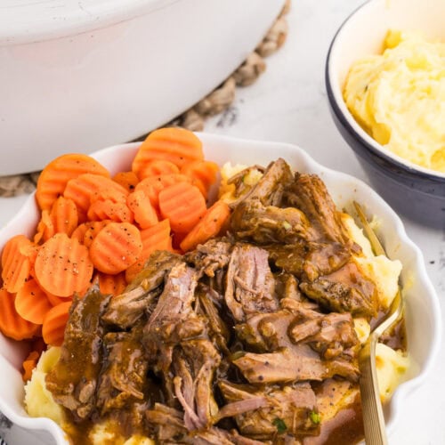 Served Slow Cooker London Broil with mashed potatoes and carrots