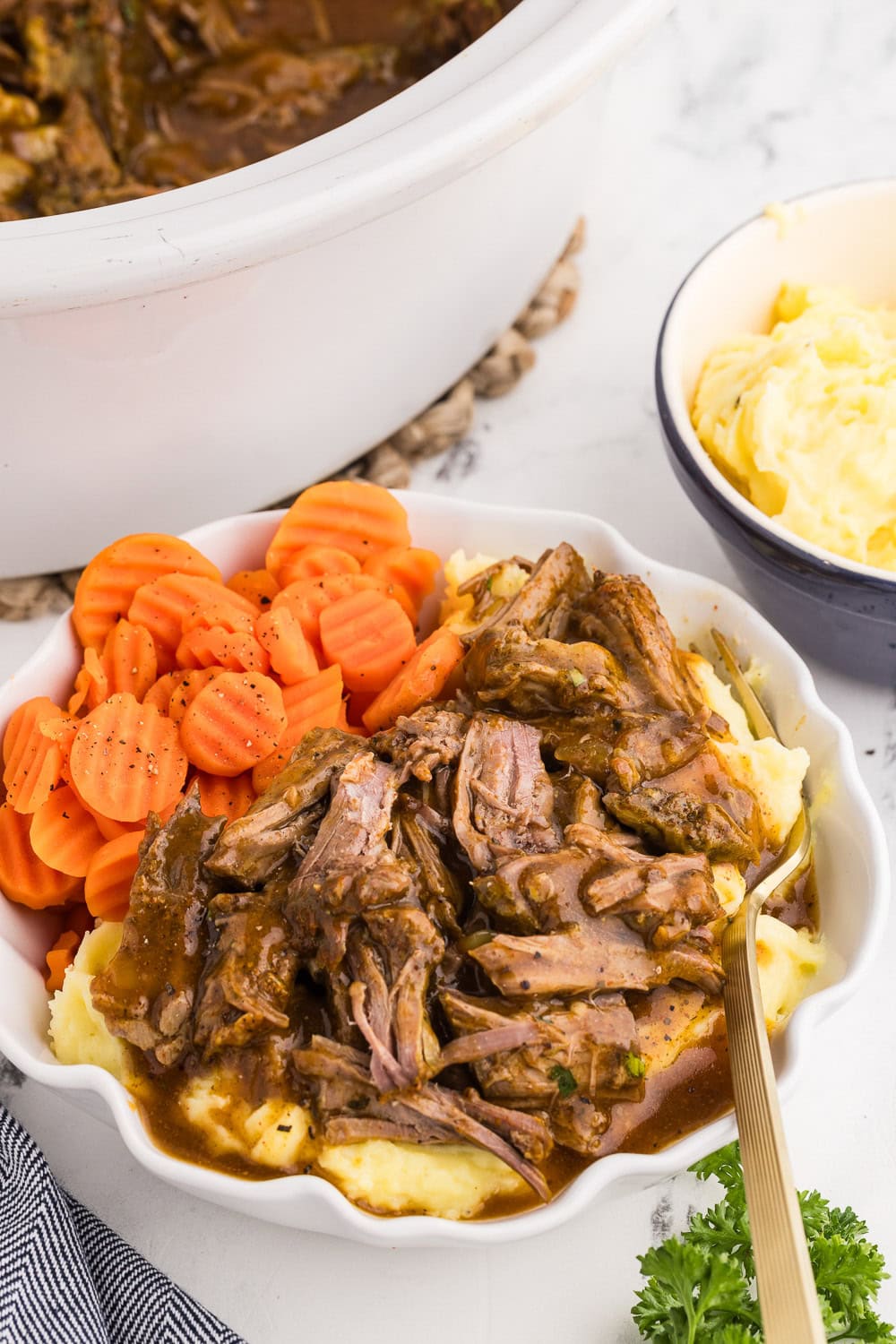 Served Slow Cooker London Broil with mashed potatoes and carrots