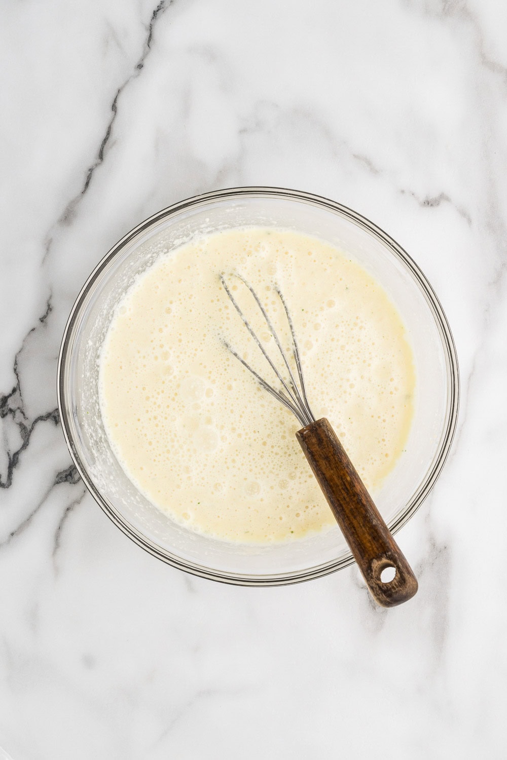 flour, cream, broth and seasonings mixed smooth in glass bowl