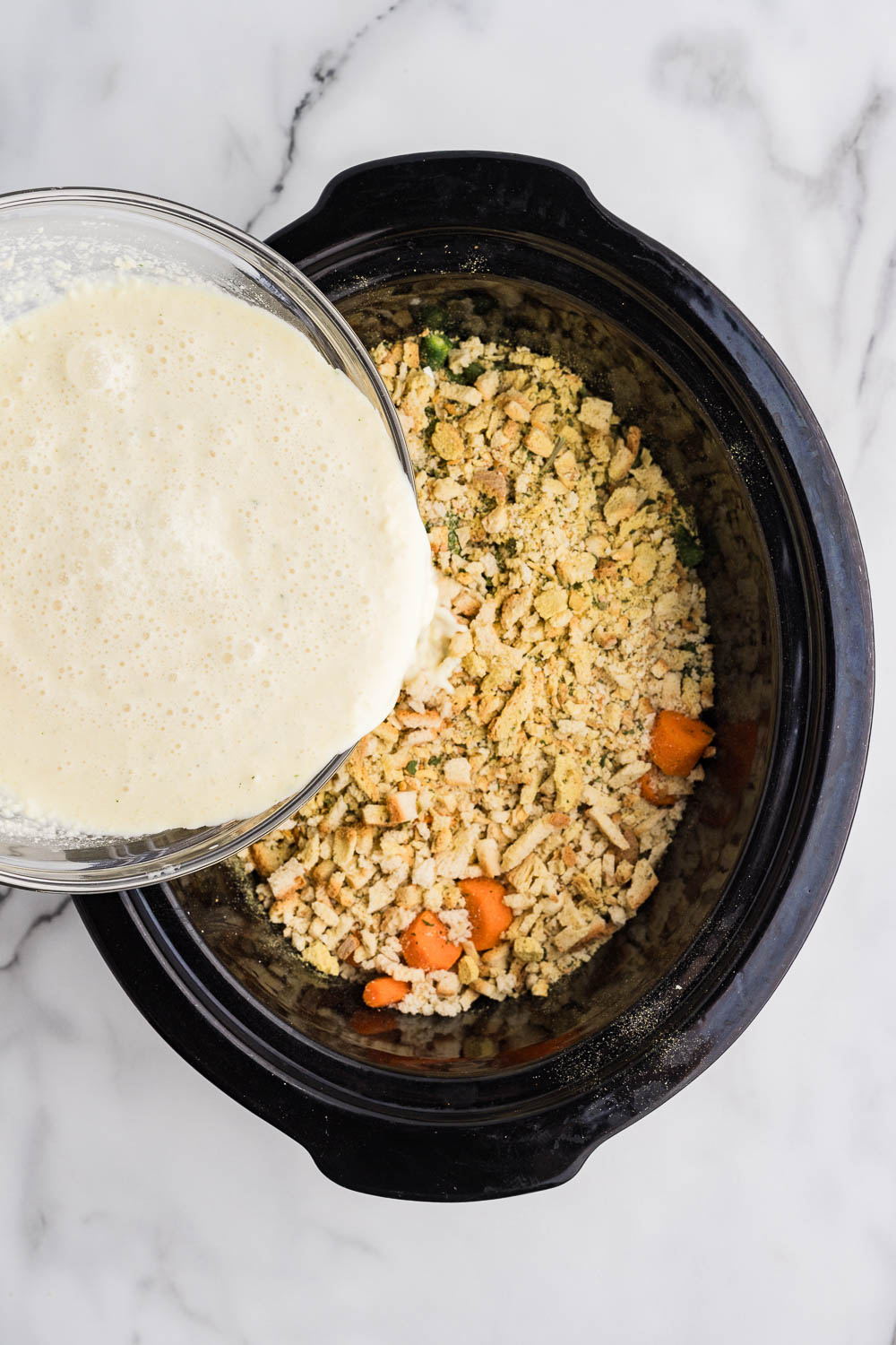 Whisking flour and butter mixture in a bowl