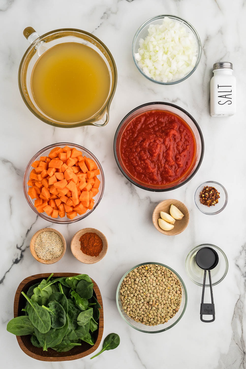 Ingredients to make lentil soup all laid out and pre-portioned on counter