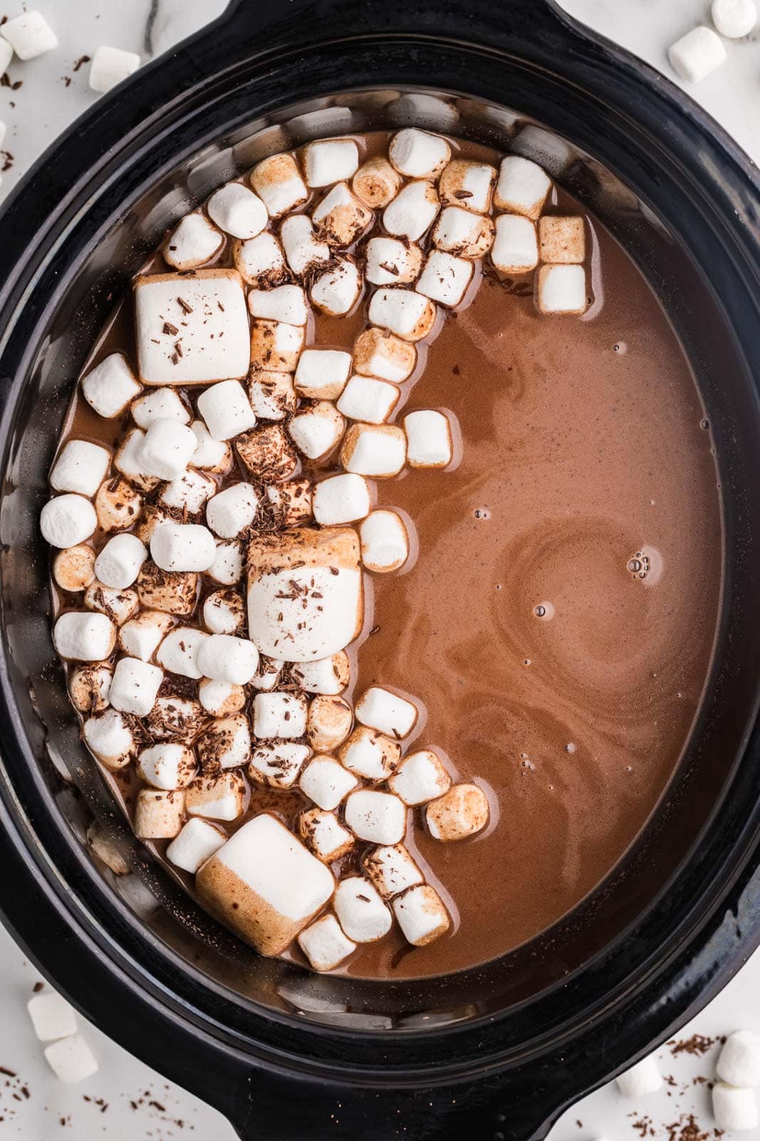 overhead view of hot chocolate mixture with marshmallows