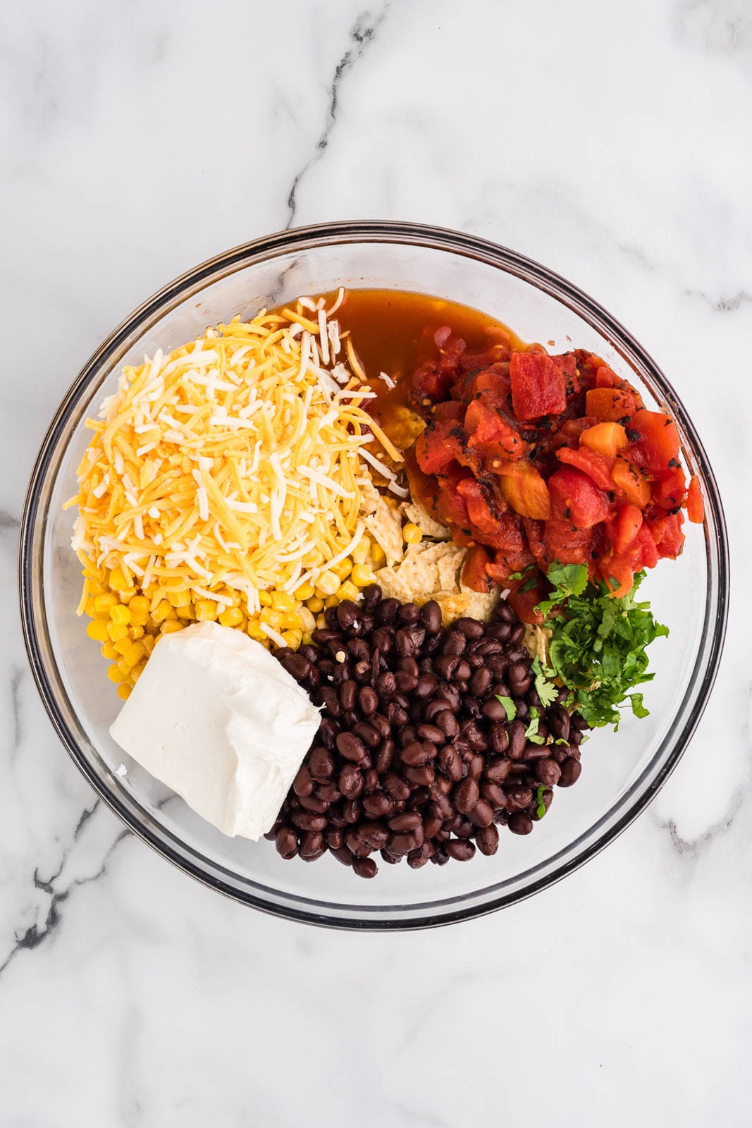 large glass bowl of all ingredients