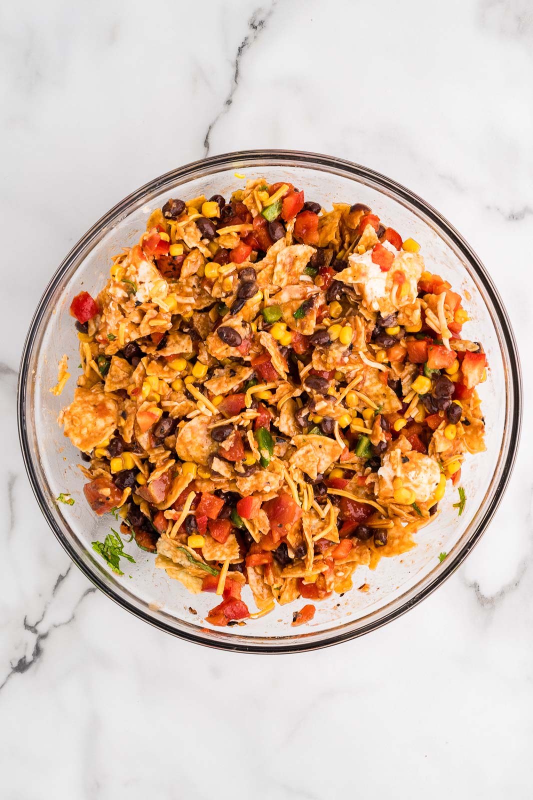 large glass bowl of all ingredients mixed together