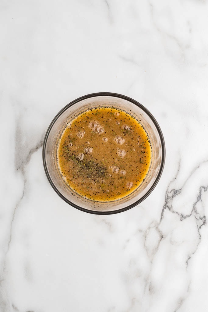 glass bowl containing sauce mixture