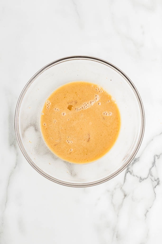 glass bowl of cornstarch and water with sauce